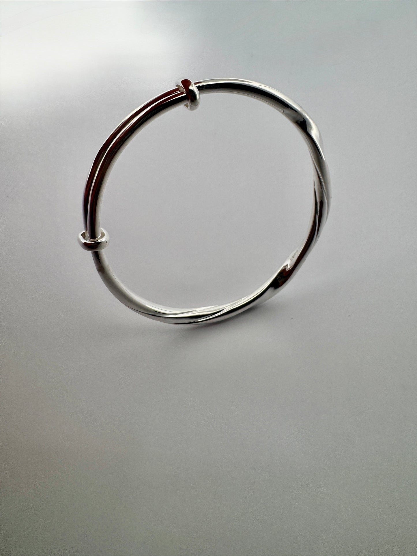 1. Twisted Hinged Bangle Design
2. Sterling Silver Adjustable Bangle
3. 925 Silver Twisted Bangle
4. Elegant Adjustable Bangle
5. Stylish Twisted Hinged Bangle