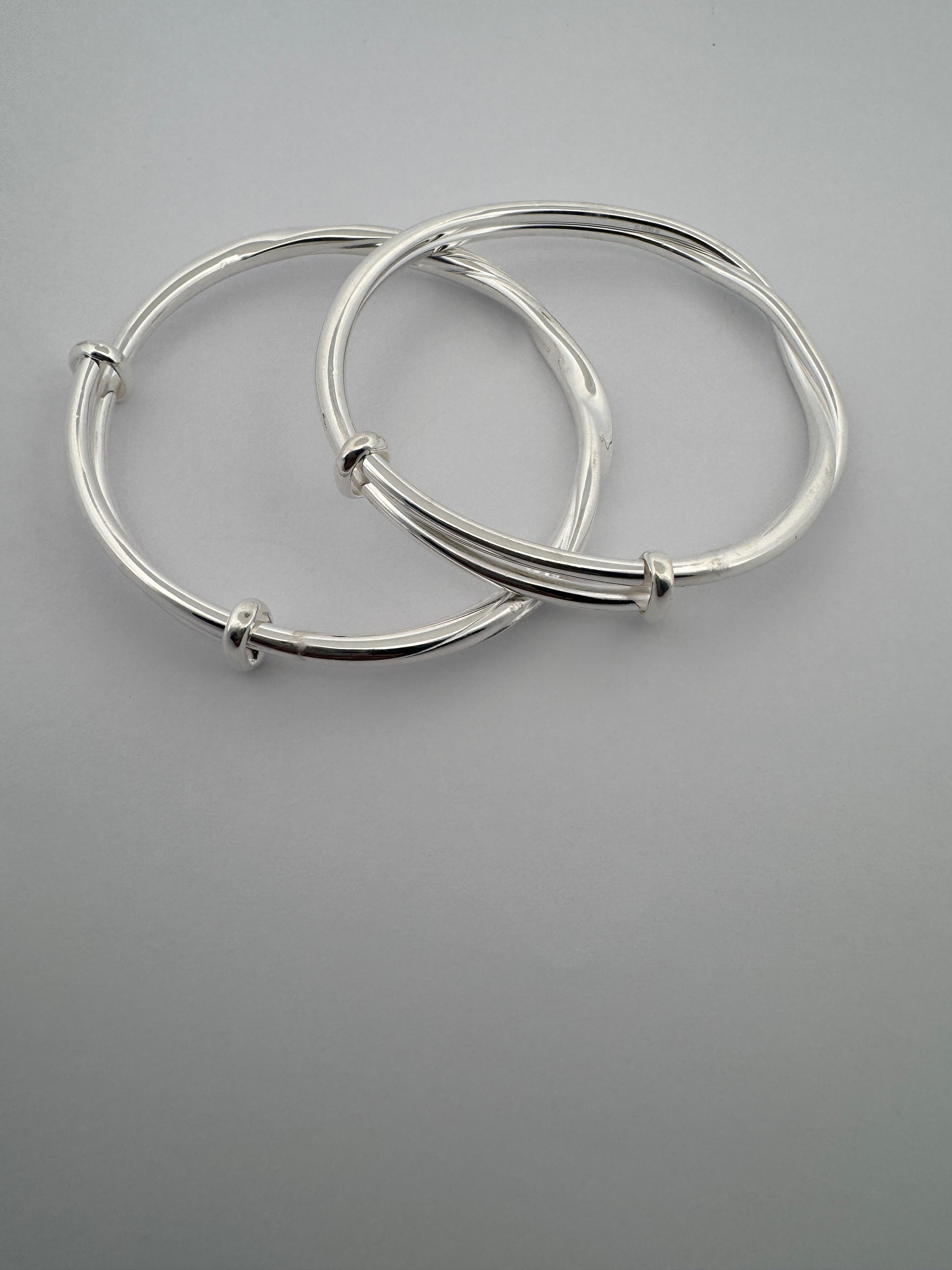 1. Twisted Hinged Bangle Design
2. Sterling Silver Adjustable Bangle
3. 925 Silver Twisted Bangle
4. Elegant Adjustable Bangle
5. Stylish Twisted Hinged Bangle