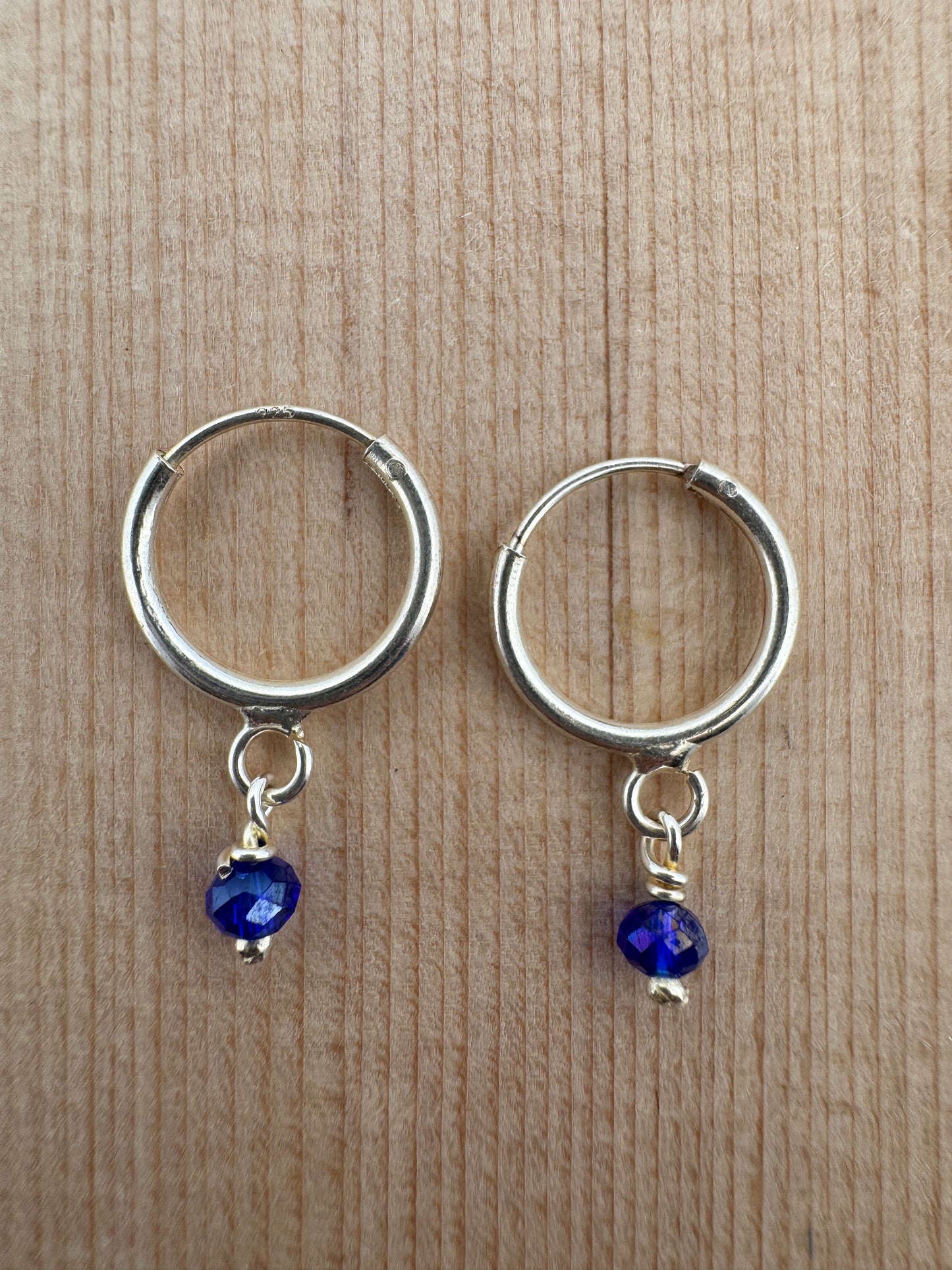 - "Handmade Hoop Earrings"
- "Austrian Crystal Jewelry"
- "Royal Blue Crystal Earrings"
- "Sterling Silver Jewelry"
- "Women's Hoop Earrings"