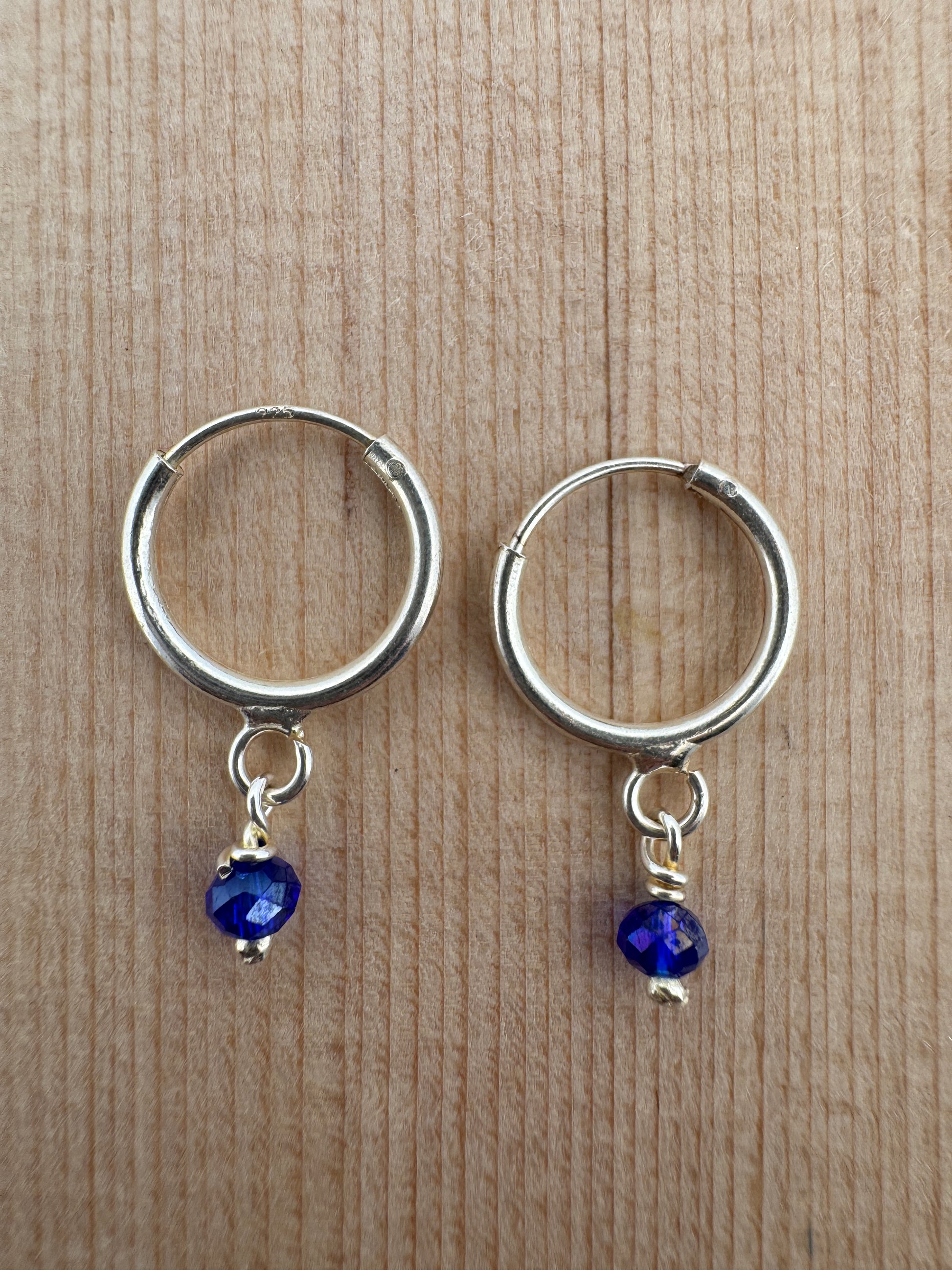 - "Handmade Hoop Earrings"
- "Austrian Crystal Jewelry"
- "Royal Blue Crystal Earrings"
- "Sterling Silver Jewelry"
- "Women's Hoop Earrings"