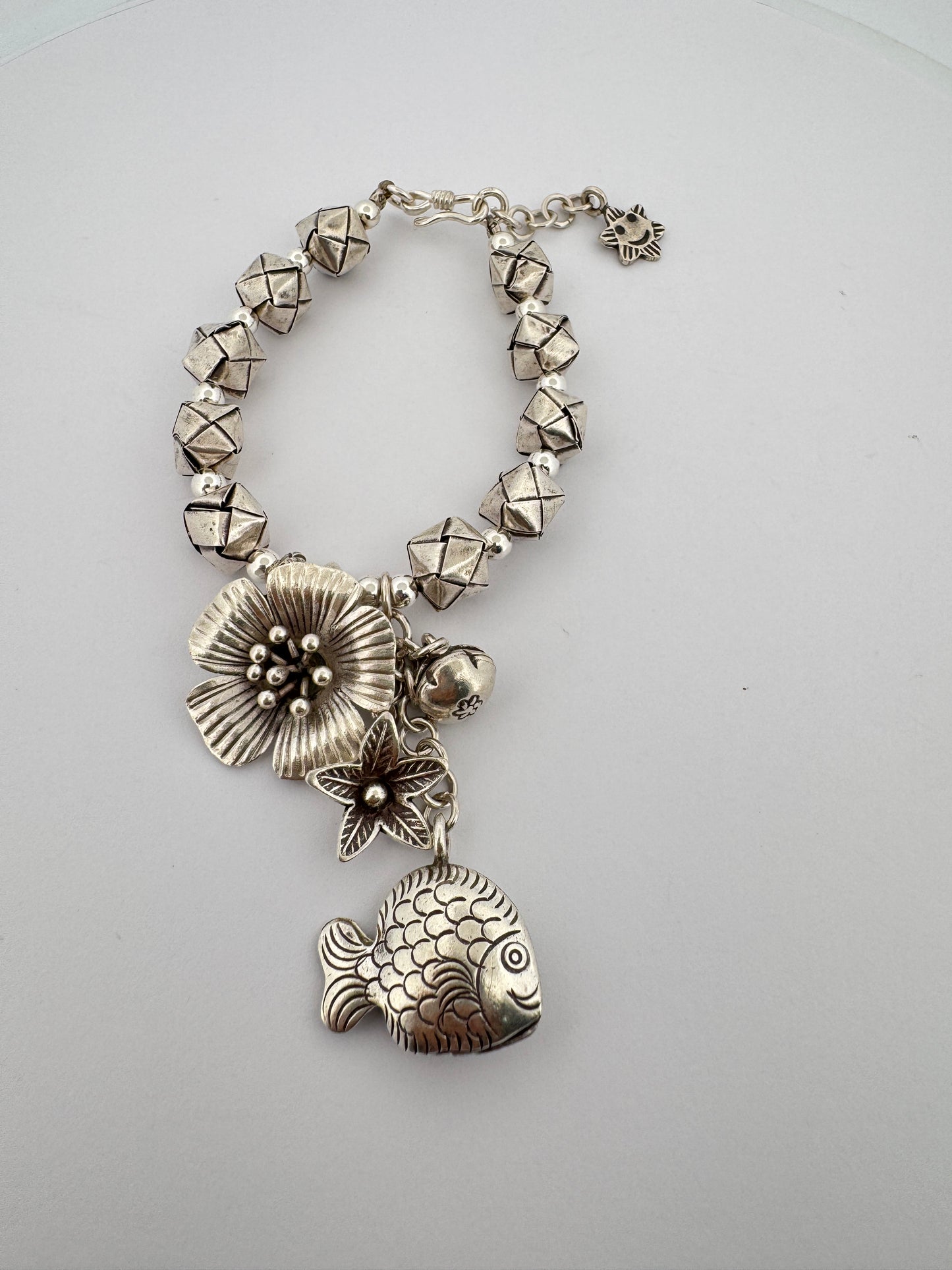 - "Antique Silver Jewelry"
- "Indian-made Jewelry"
- "Sterling Silver Charms"
- "Vintage-inspired Jewelry"
- "Handmade Jewelry"