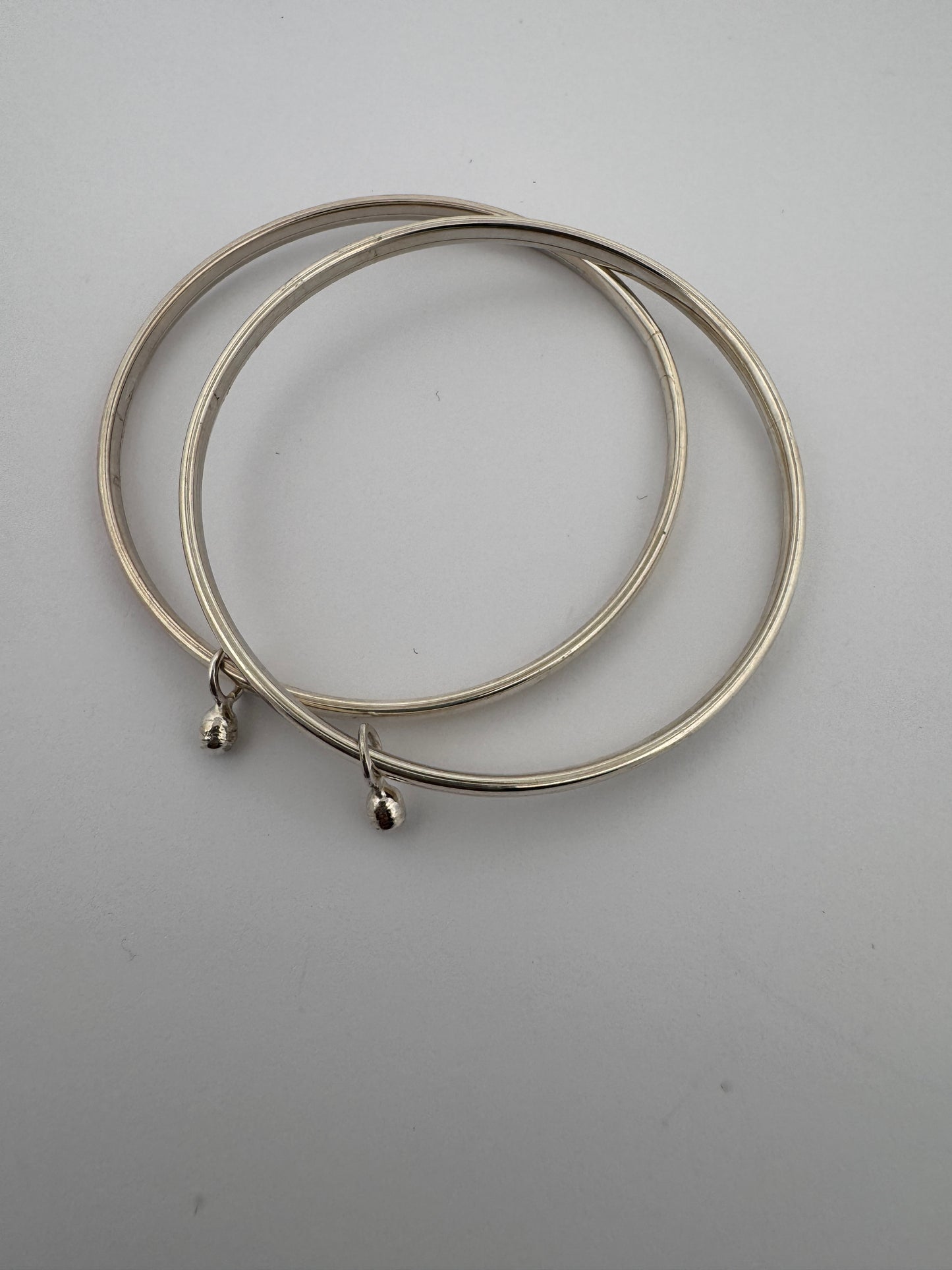1. Sterling Silver Bangle with Soundless Anklets
2. Hinge Bangle Design
3. 925 Silver Bangle with Gumgarao
4. Elegant Hinge Bangle
5. Traditional Indian Bangle