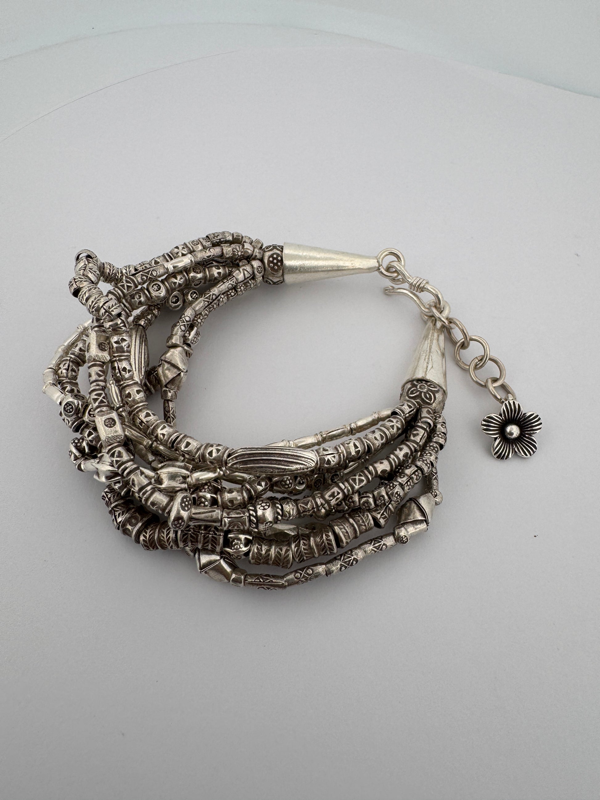 - "Bohemian Style Jewelry"
- "Vintage-Inspired Accessories"
- "Handmade Sterling Silver"
- "Indian-Made Jewelry"
- "Stackable Bangles"